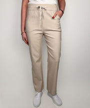 Byxa Flared med Stretch i Beige från Caramelle Fashion - framsida | Lilla Hem