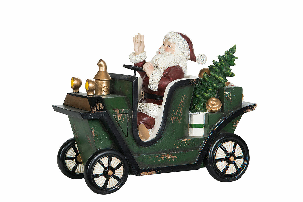 Dekorativ julfigur föreställande tomte i grön bil med juldekorationer och träd | A Lot Decoration | Lilla Hem